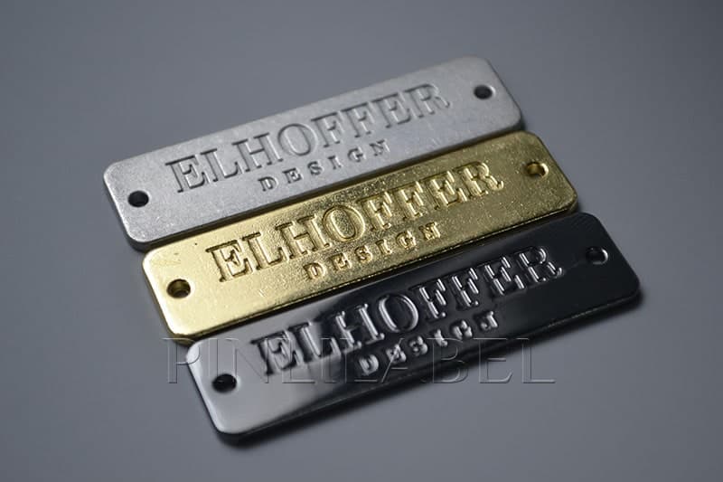 Custom Made White Color Zinc Alloy Metal Label for Clothing - China Custom  Metal Tag, Metal Label